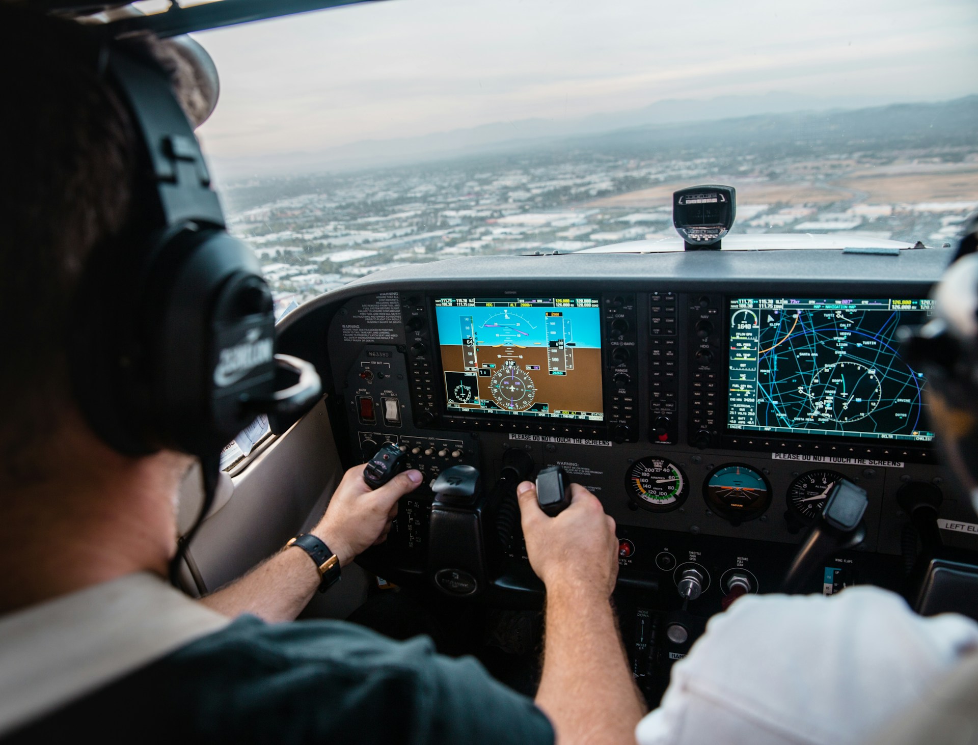 Student pilot in private aircraft cockpit